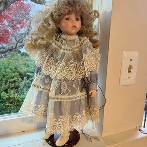 Elegant Lace Doll with Curly Hair